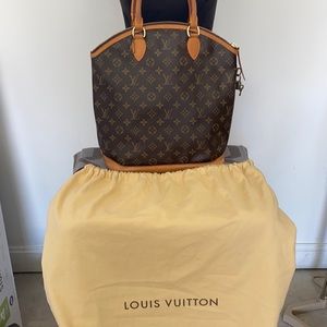 A Vintage Louis Vuitton lock it
